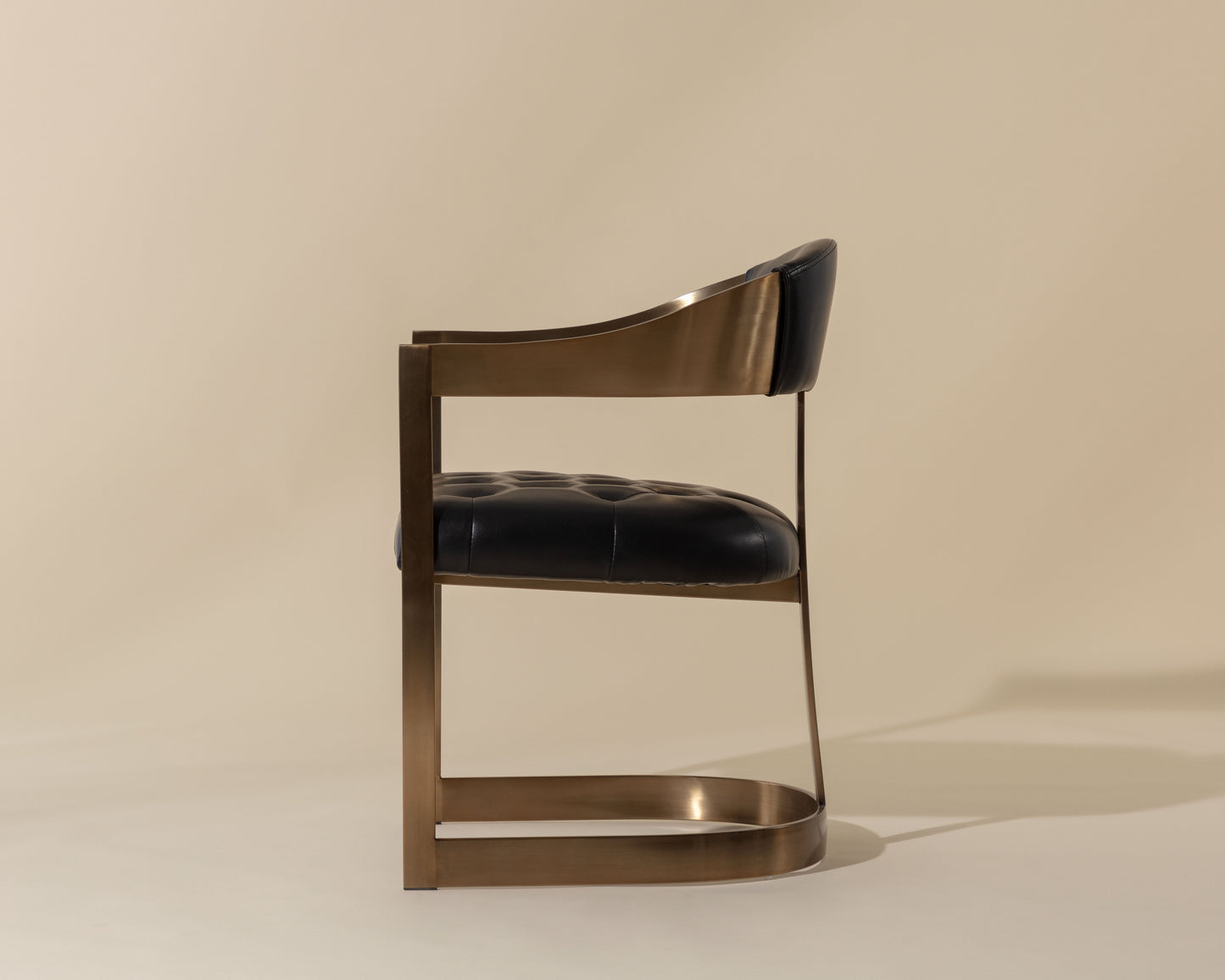 NAHLA BEAUMONT DINING ARMCHAIR - ANTIQUE BRASS - CANTINA BLACK