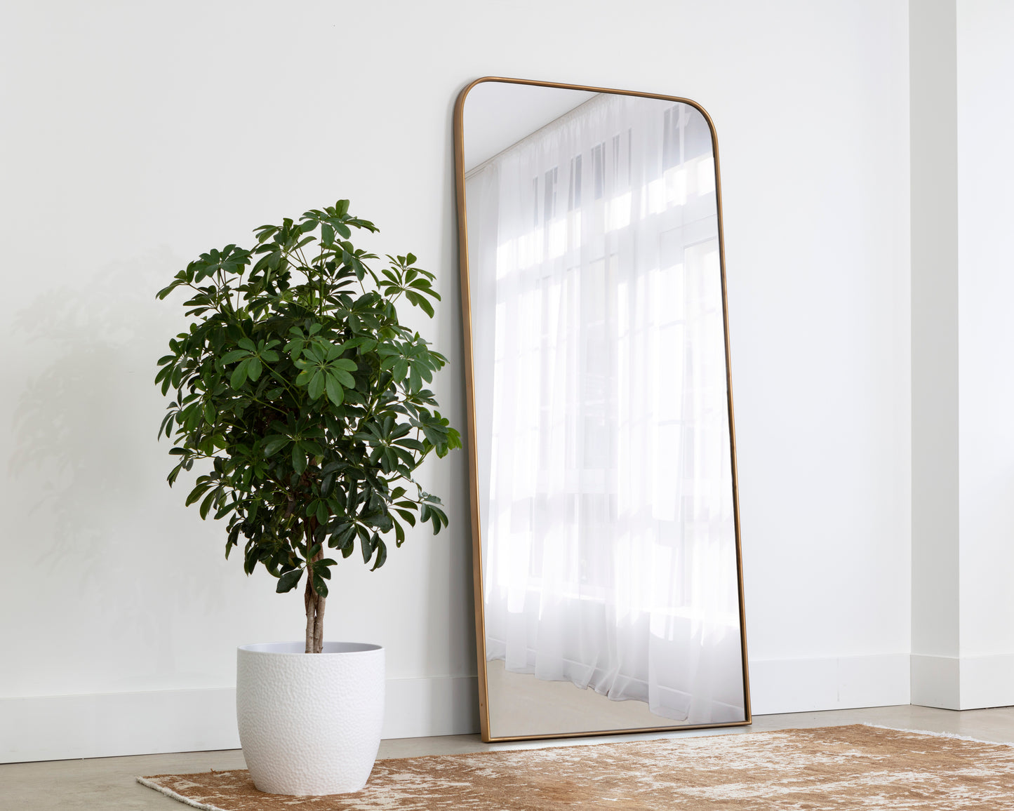 NAHLA CALABASAS FLOOR MIRROR - BRASS
